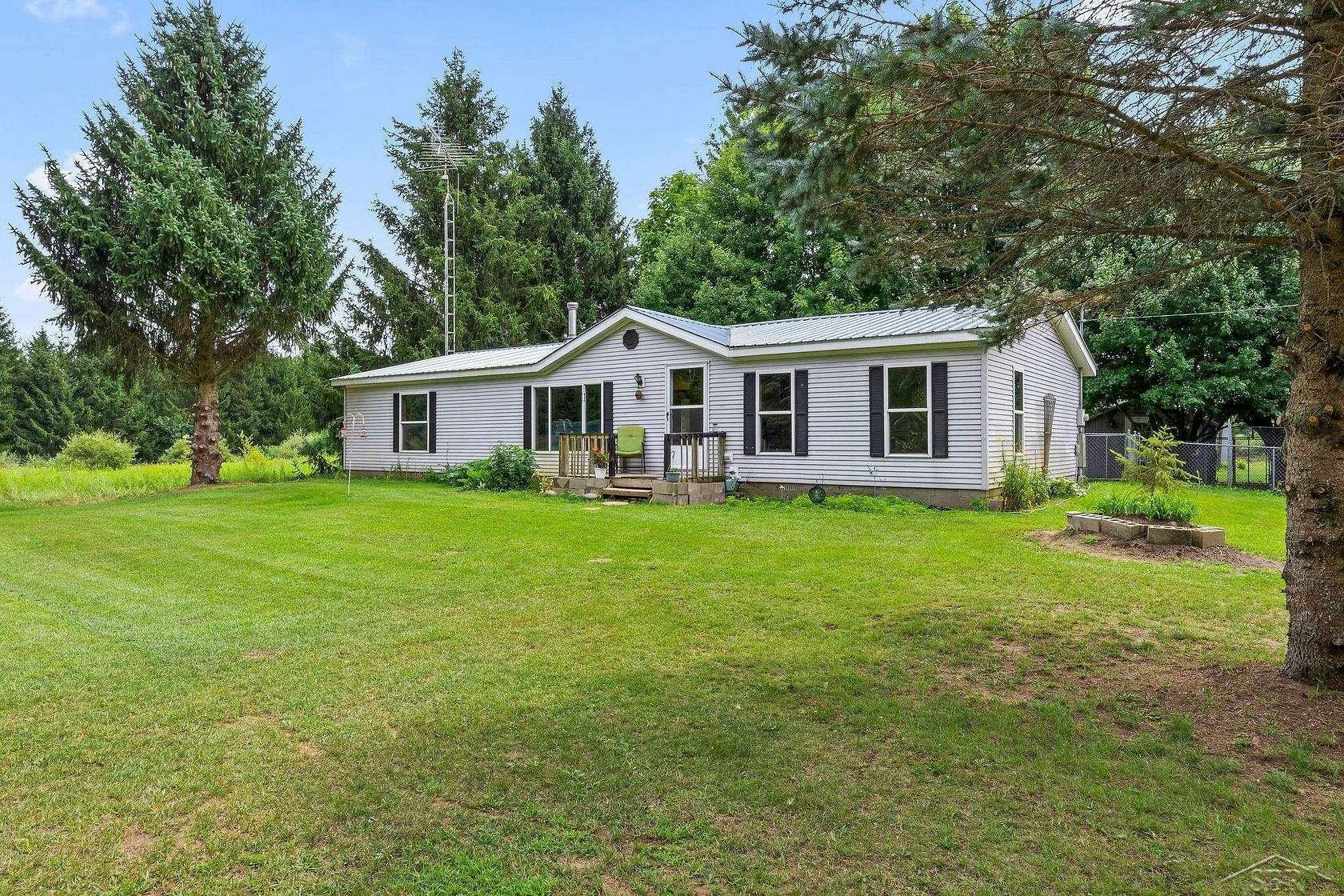 6.9 Acres of Land with Home for Sale in Harrison, Michigan
