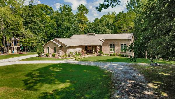 2 Acres of Land with Home for Sale in Palmyra, Tennessee