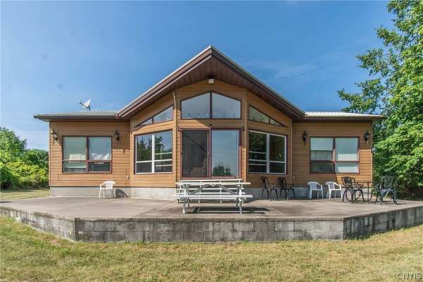 5.43 Acres of Land with Home for Sale in Three Mile Bay, New York