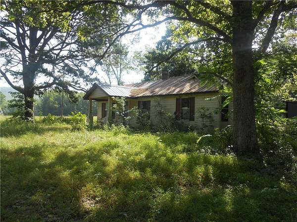 5.16 Acres of Land with Home for Sale in Elkins, Arkansas
