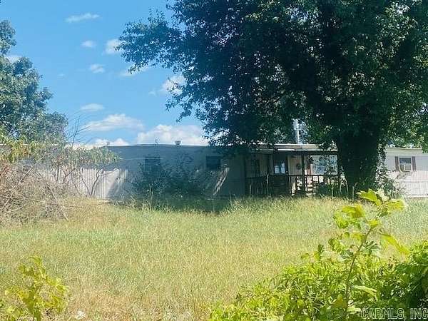 4 Acres of Land with Home for Sale in Cove, Arkansas