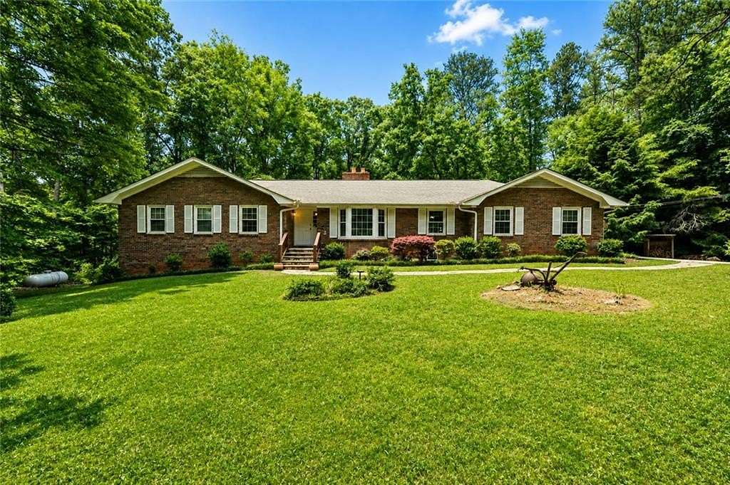 5.6 Acres of Land with Home for Sale in Powder Springs, Georgia