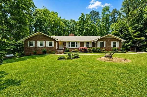 5.6 Acres of Land with Home for Sale in Powder Springs, Georgia