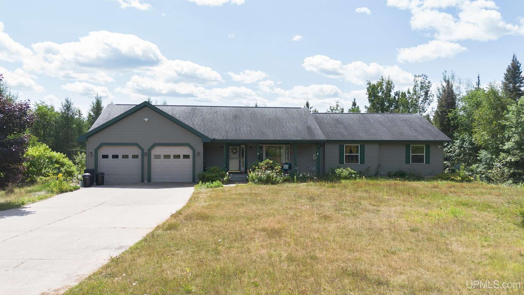 150 Acres of Recreational Land with Home for Sale in Republic, Michigan