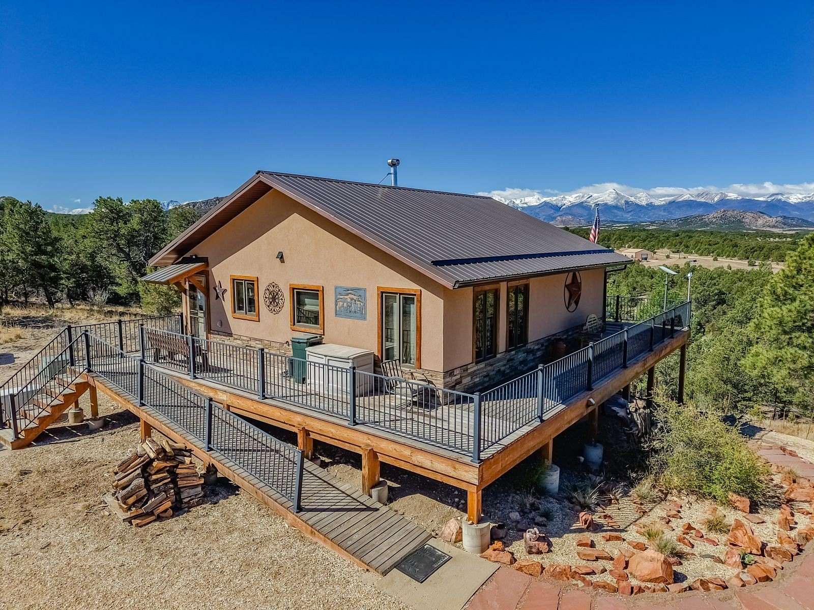 38 Acres of Agricultural Land with Home for Sale in Cotopaxi, Colorado