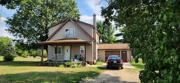 50 Acres of Land with Home for Sale in White Cloud, Michigan