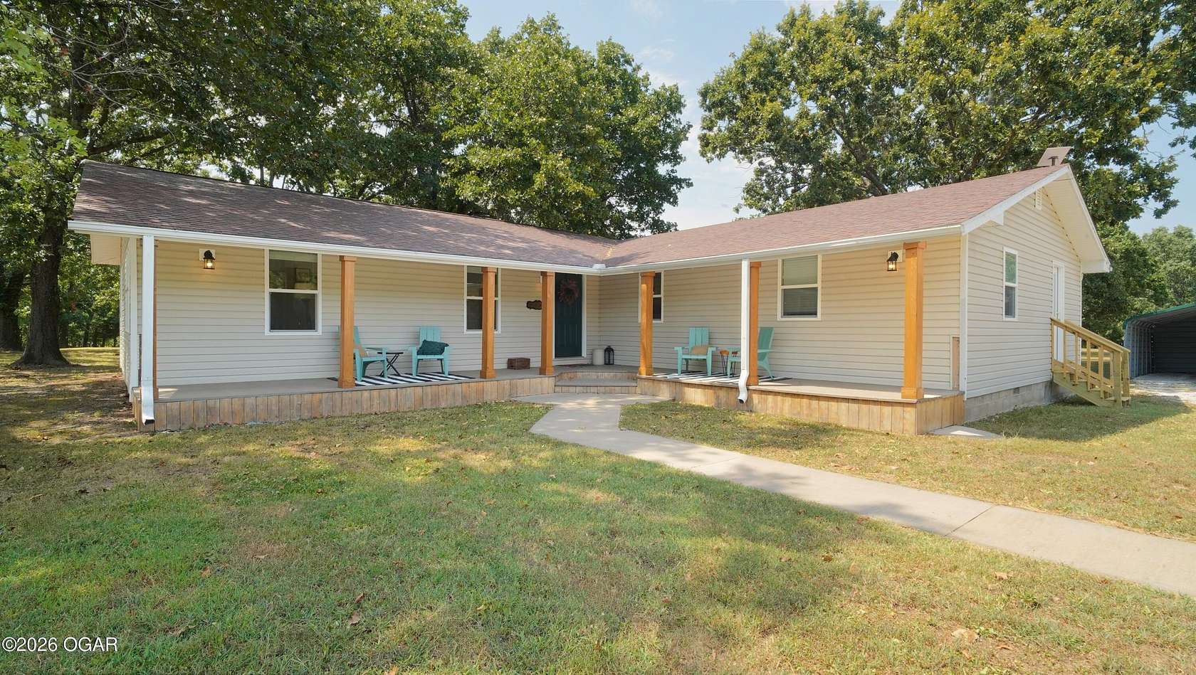 6.85 Acres of Land with Home for Sale in Carthage, Missouri