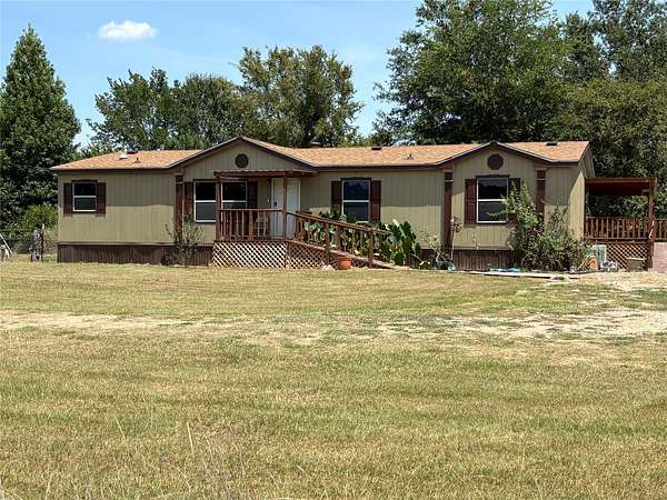 2.31 Acres of Land with Home for Sale in Sulphur Springs, Texas