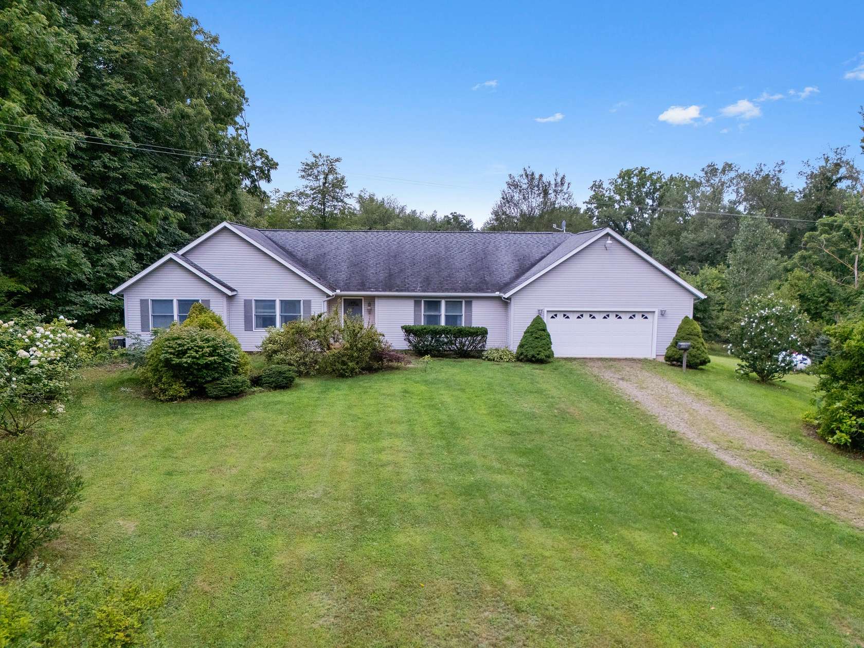 35 Acres of Recreational Land with Home for Sale in Quincy, Michigan
