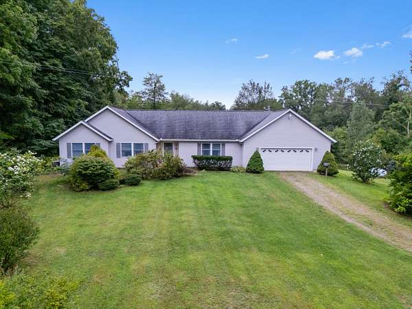 35 Acres of Recreational Land with Home for Sale in Quincy, Michigan