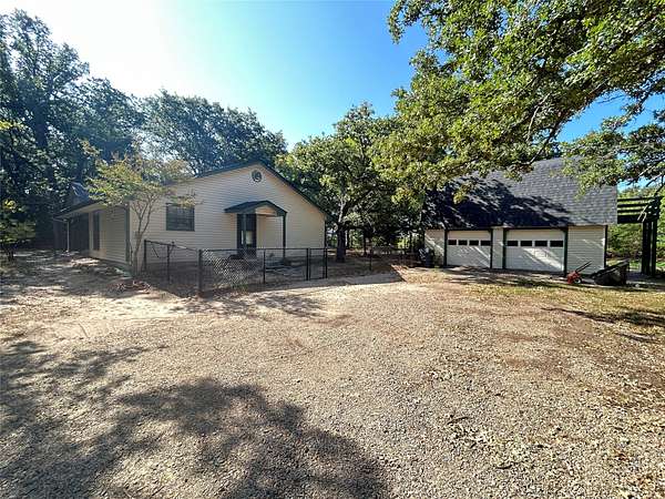 9.29 Acres of Land with Home for Sale in Cumby, Texas