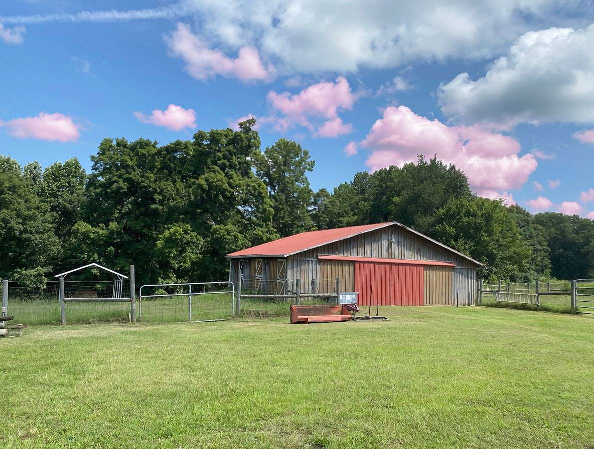 7.47 Acres of Land with Home for Sale in Charlotte, Tennessee