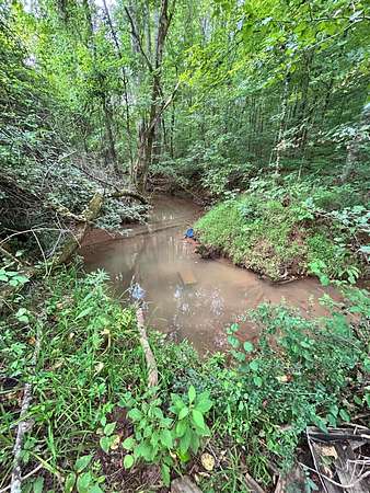 7.73 Acres of Land with Home for Sale in Madisonville, Tennessee