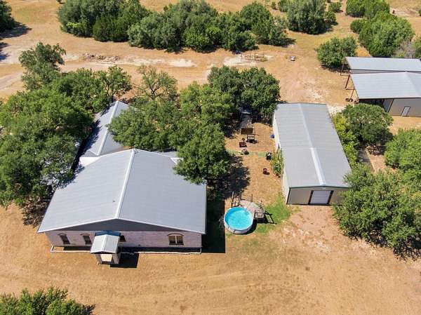 6.8 Acres of Land with Home for Sale in Morgan, Texas