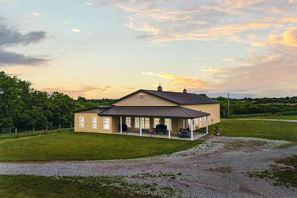 59.1 Acres of Land with Home for Sale in Winchester, Kentucky