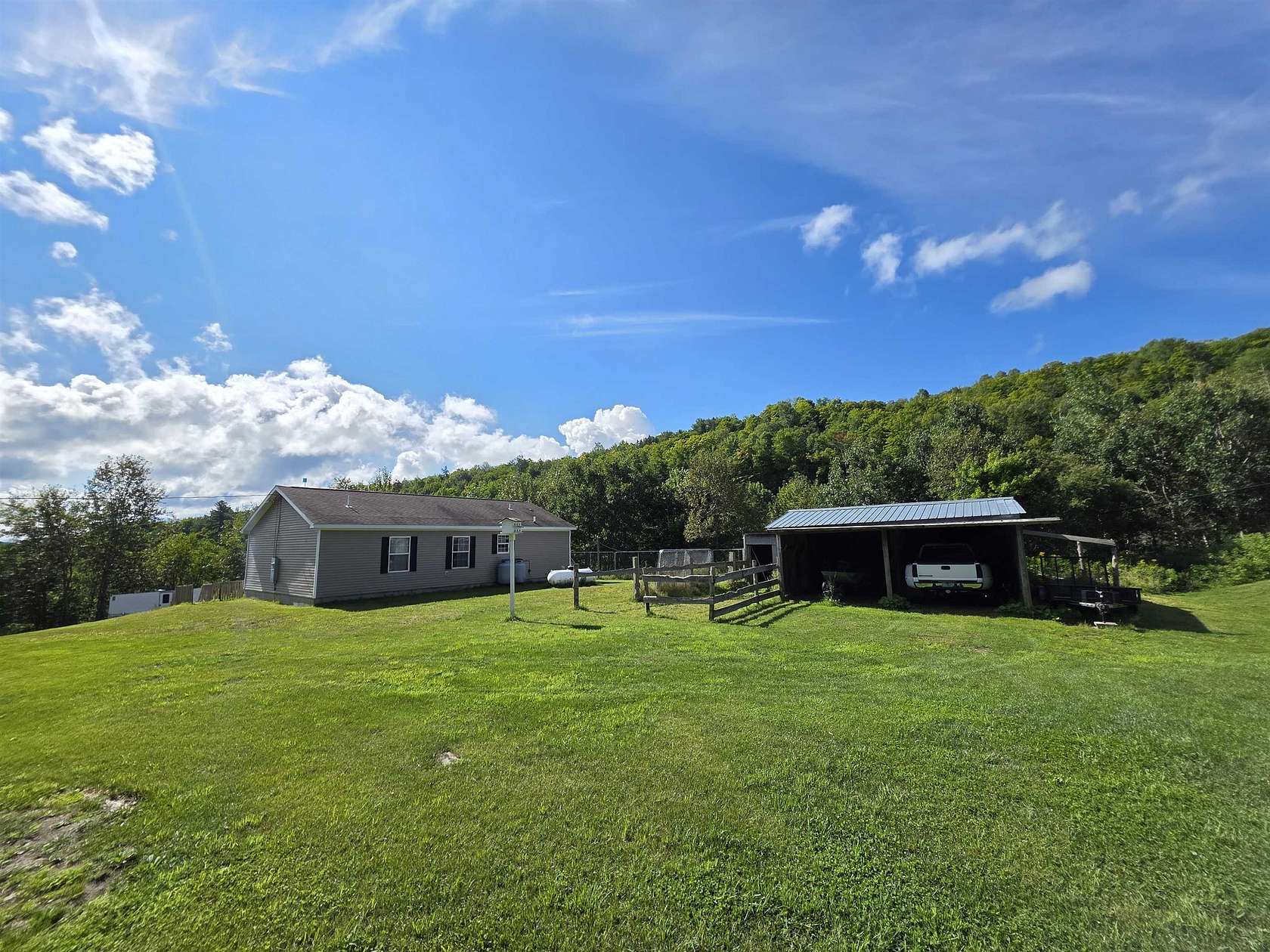 4 Acres of Land with Home for Sale in Sutton, Vermont