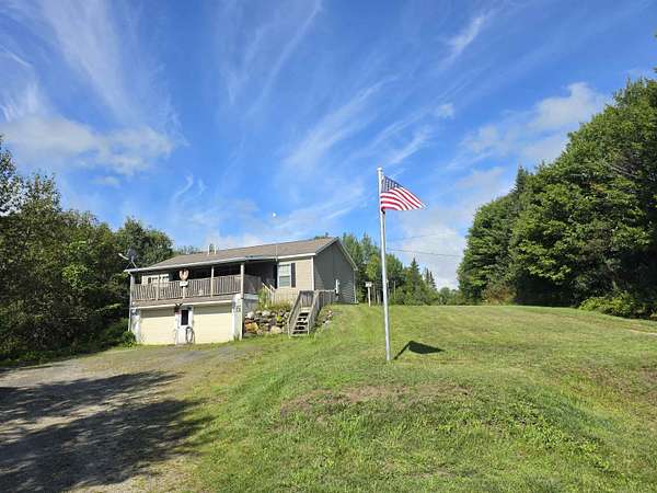 4 Acres of Land with Home for Sale in Sutton, Vermont