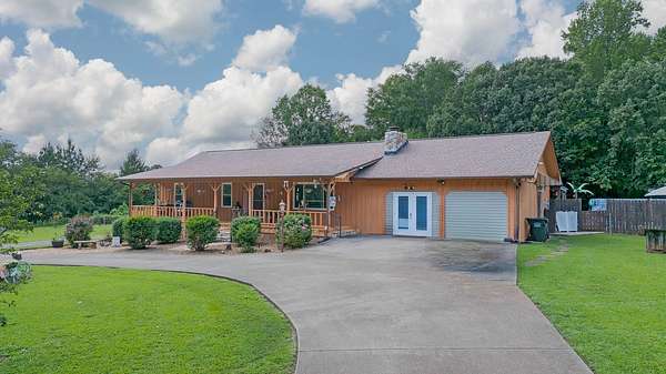 4.34 Acres of Land with Home for Sale in Riceville, Tennessee