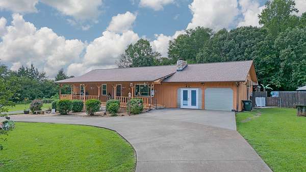 4.34 Acres of Land with Home for Sale in Riceville, Tennessee