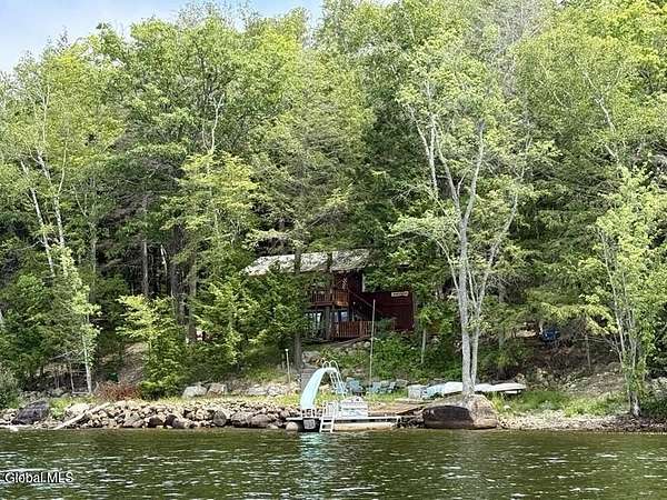 3.9 Acres of Land with Home for Sale in Schroon Lake, New York