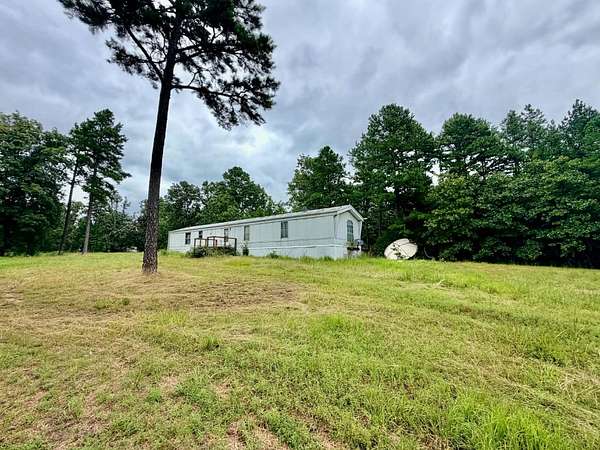 11 Acres of Recreational Land with Home for Sale in Winona, Missouri