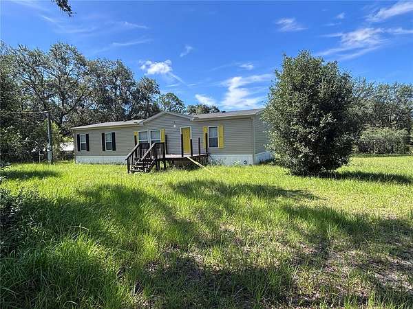 1.8 Acres of Land with Home for Sale in Interlachen, Florida