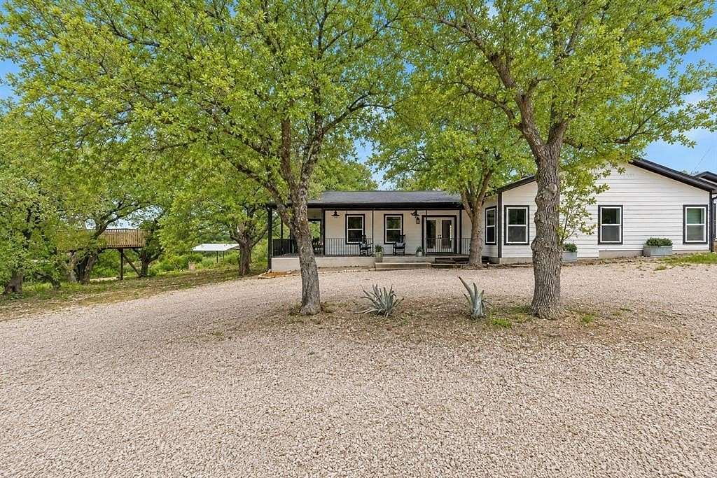7.79 Acres of Land with Home for Sale in Johnson City, Texas
