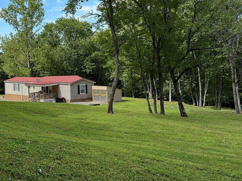 1.5 Acres of Land with Home for Sale in Copperhill, Tennessee