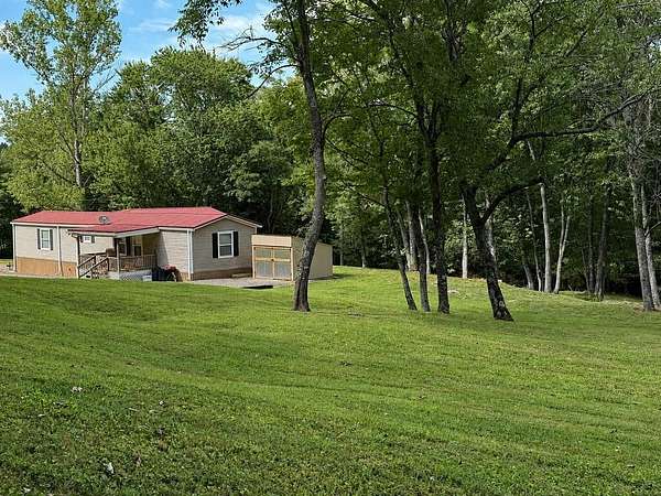 1.5 Acres of Land with Home for Sale in Copperhill, Tennessee