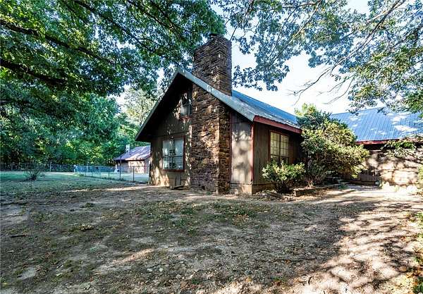 7 Acres of Land with Home for Sale in Gentry, Arkansas