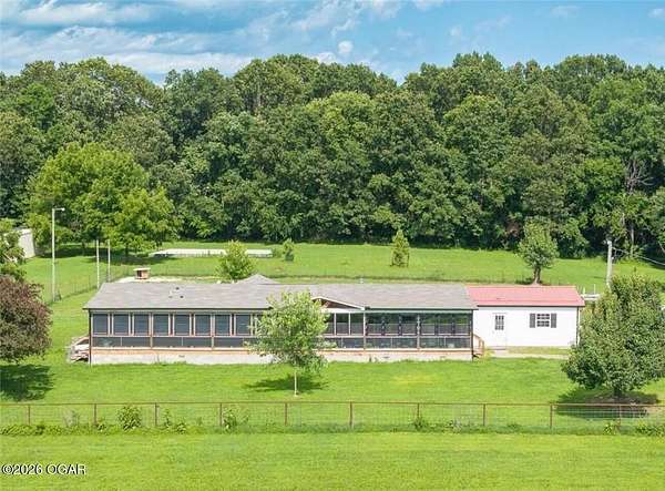 19.7 Acres of Land with Home for Sale in Granby, Missouri