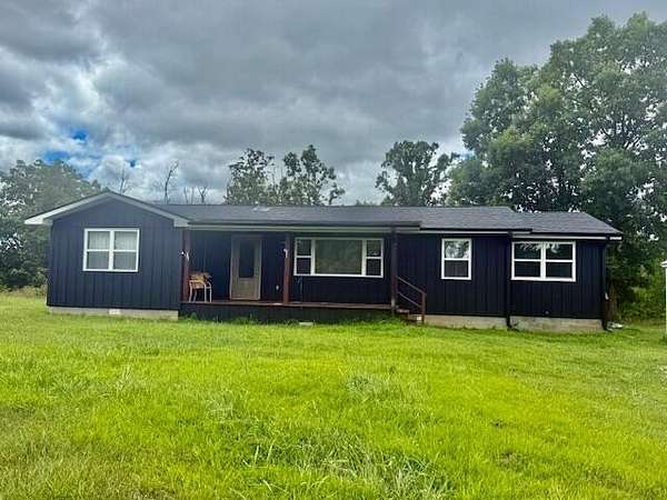 4.9 Acres of Land with Home for Sale in West Plains, Missouri