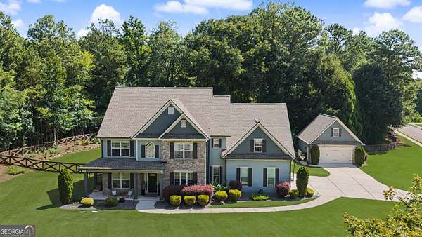 1.69 Acres of Land with Home for Sale in Sharpsburg, Georgia