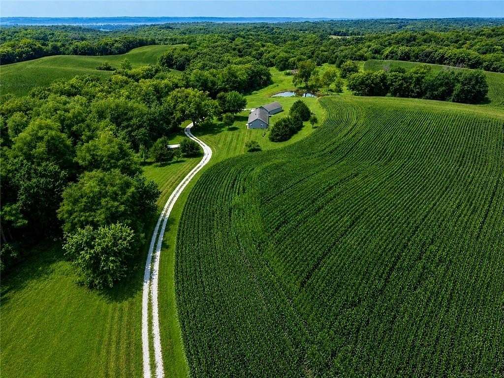 40 Acres of Land with Home for Sale in Amazonia, Missouri