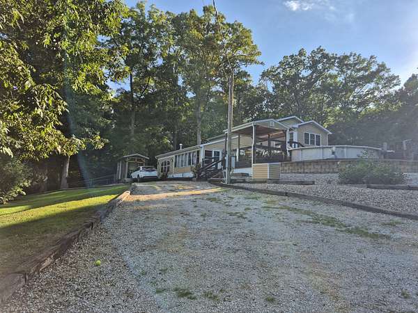 30 Acres of Recreational Land with Home for Sale in Versailles, Missouri