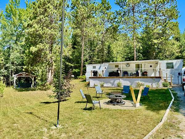 10.2 Acres of Recreational Land with Home for Sale in Wolverine, Michigan