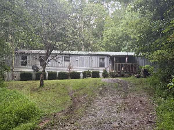 5 Acres of Land with Home for Sale in Sneedville, Tennessee