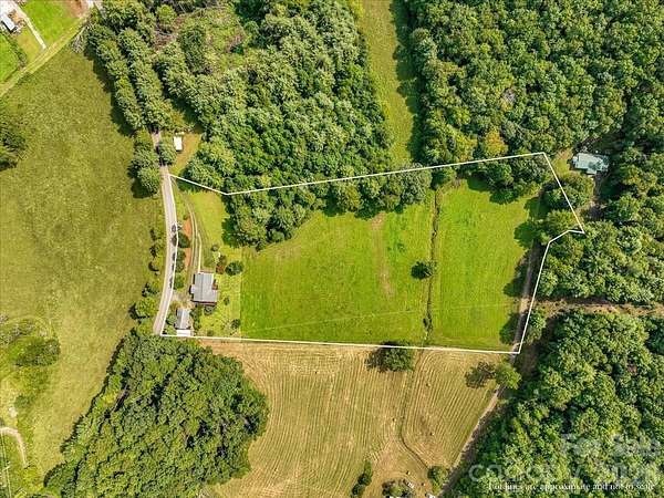 5.5 Acres of Land with Home for Sale in Green Mountain, North Carolina