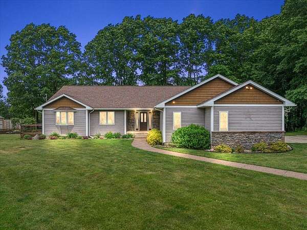 19.2 Acres of Land with Home for Sale in Grant, Michigan