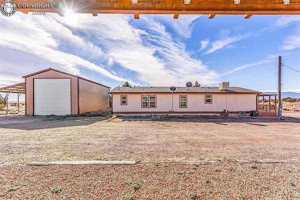 9.43 Acres of Land with Home for Sale in Penrose, Colorado