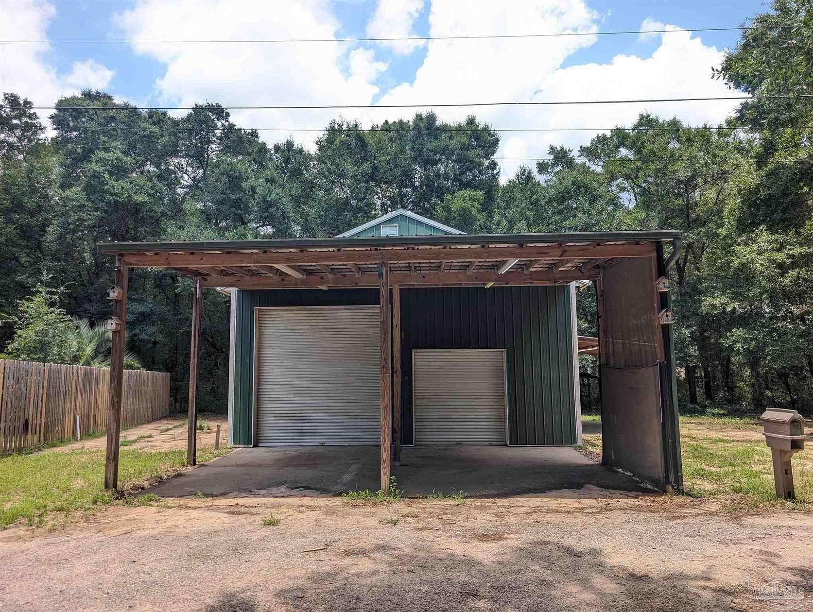5.8 Acres of Land with Home for Lease in Milton, Florida