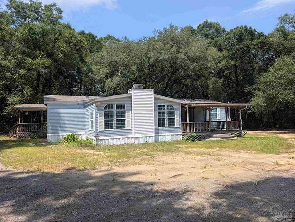 5.8 Acres of Land with Home for Lease in Milton, Florida