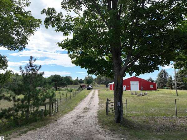 5.1 Acres of Land with Home for Sale in Mancelona, Michigan
