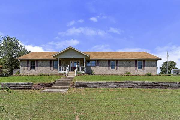13.3 Acres of Land with Home for Sale in Conway, Missouri