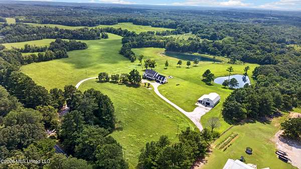 58 Acres of Land with Home for Sale in Lamar, Mississippi