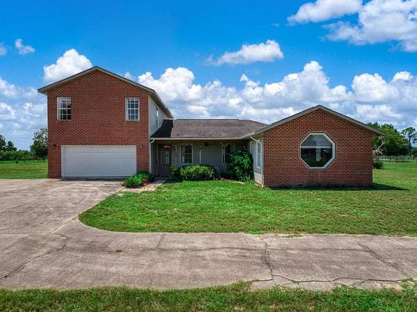 5 Acres of Land with Home for Sale in Lake Placid, Florida