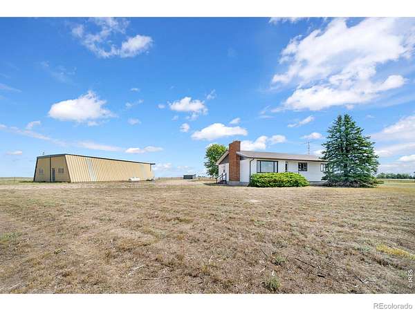 11 Acres of Land with Home for Sale in Fleming, Colorado