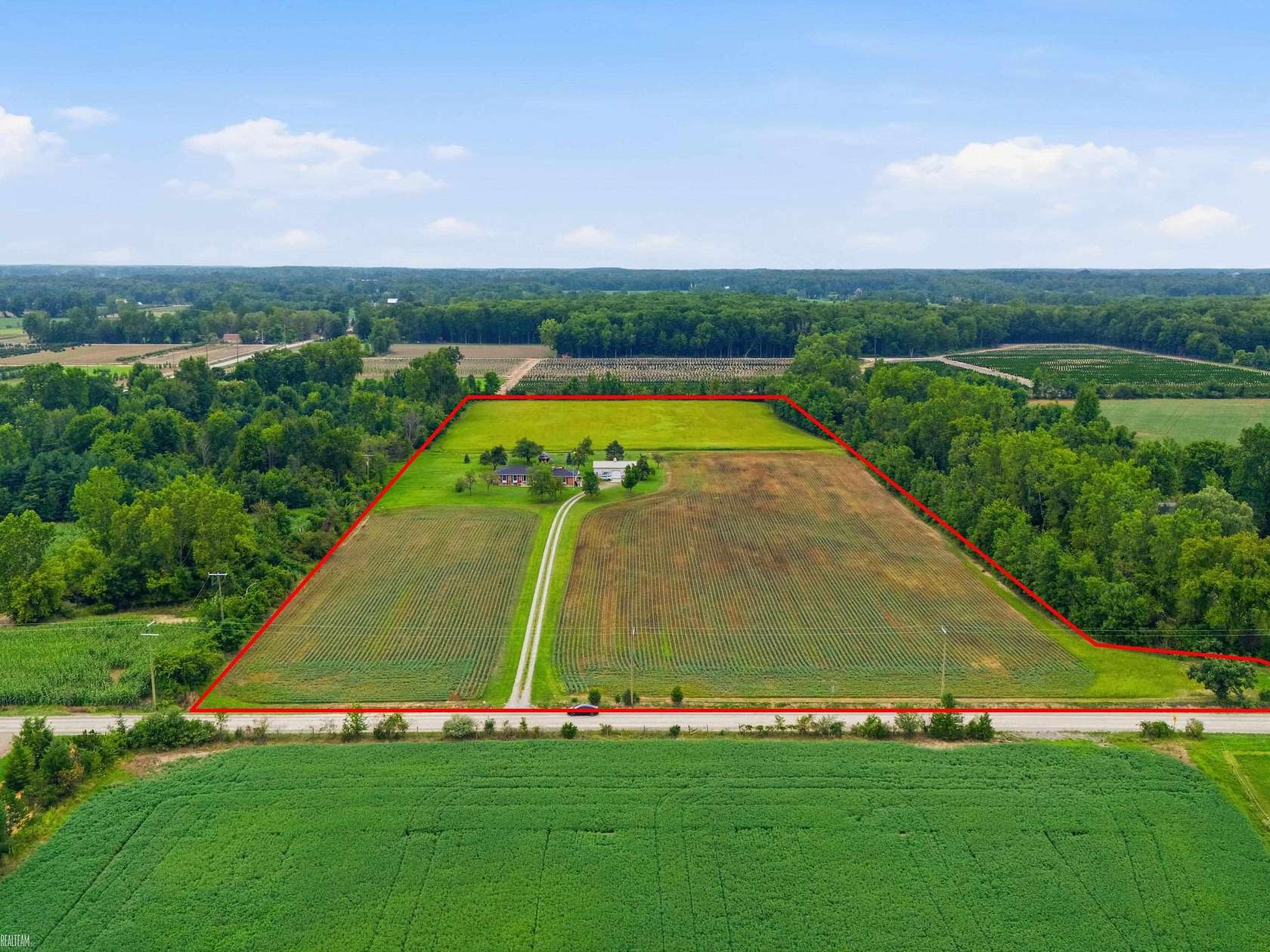16.9 Acres of Land with Home for Sale in Lenox Township, Michigan