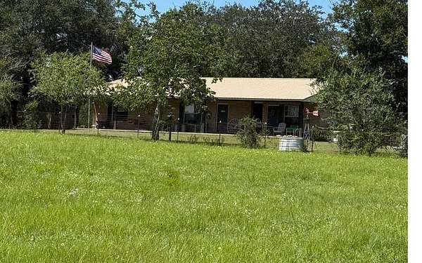 13.4 Acres of Land with Home for Auction in McAlpin, Florida