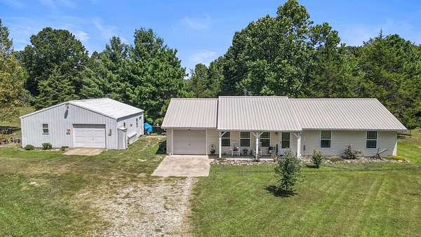 2.7 Acres of Land with Home for Sale in Caulfield, Missouri